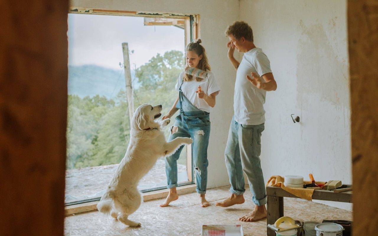 A couple builds equity in their home by painting a room.