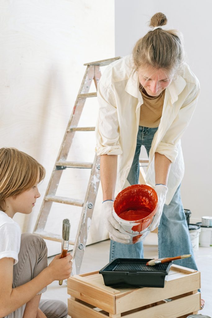 A woman makes renovations in her home to increase her home's value.